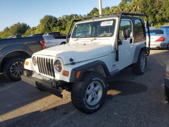  Salvage Jeep Wrangler